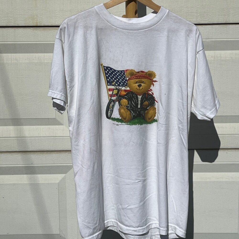 T-Shirt with Graphic of a Motorcyclist Bear With a Motorcycle and American Flag